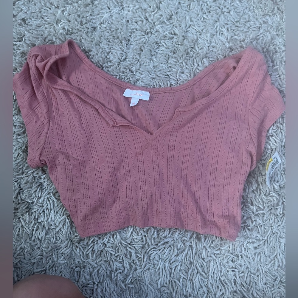 Such a cute top fits small and medium